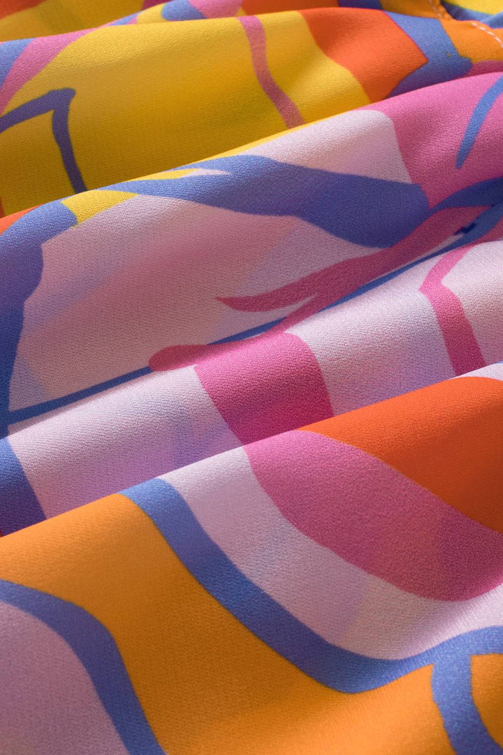 a close up of a colorful fabric with a pattern