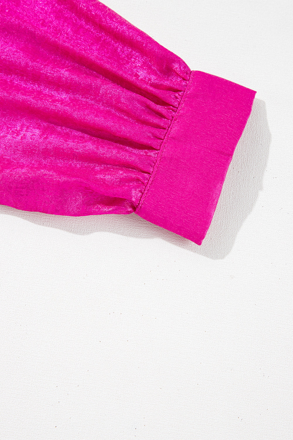 Sleeve cuff detail of Pink Metallic Frilled V Neck Puff Sleeve Babydoll Blouse, showing gathered velvet fabric and tailored finish.
