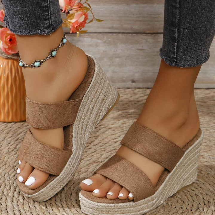 a close up of a person wearing sandals