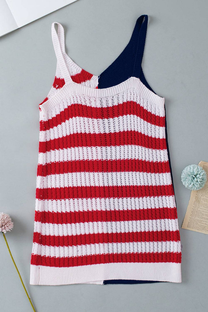 a red, white and blue striped tank top next to a flower