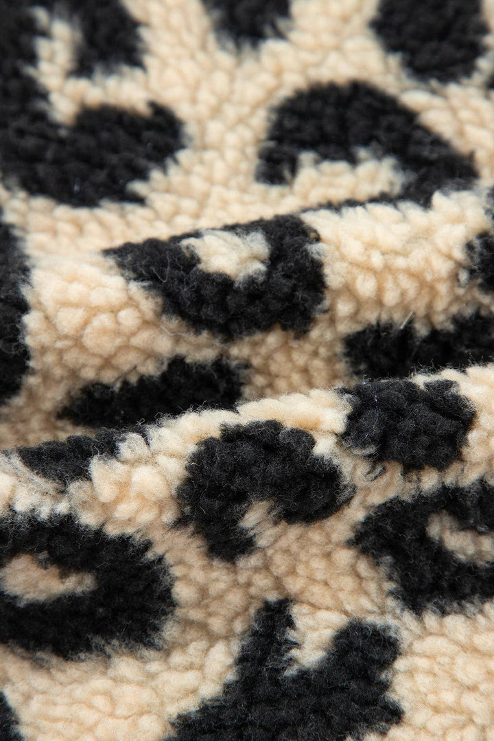 a close up of a black and white blanket