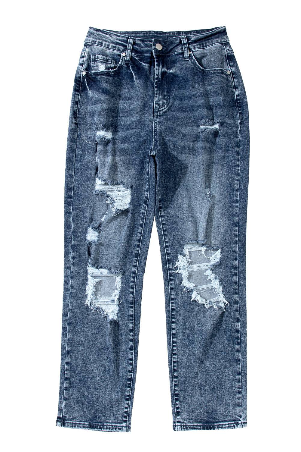 a pair of blue jeans with holes on them