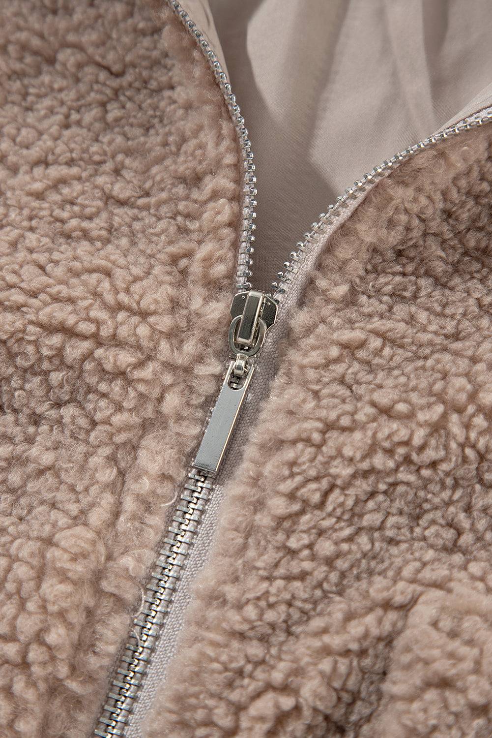 a close up of a zipper on a jacket