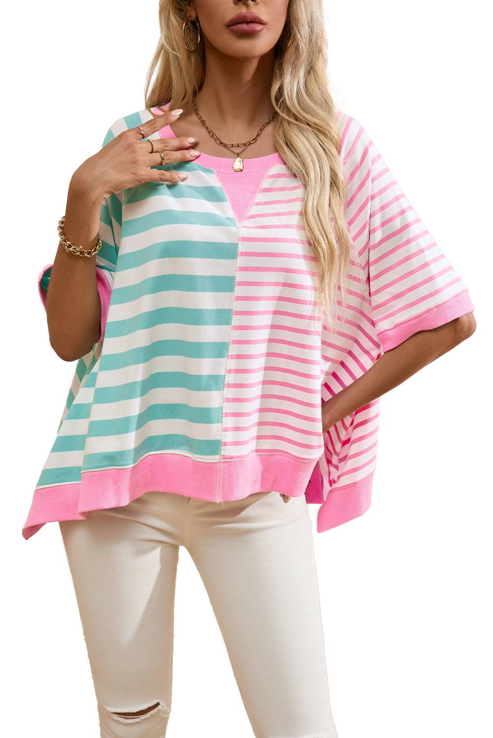 a woman wearing a pink and green striped top