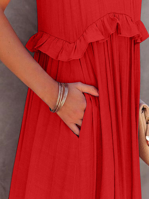 a woman in a red dress is holding her purse