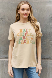 a woman wearing a t - shirt that says half coffee half teacher