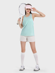a woman holding a tennis racquet on a white background