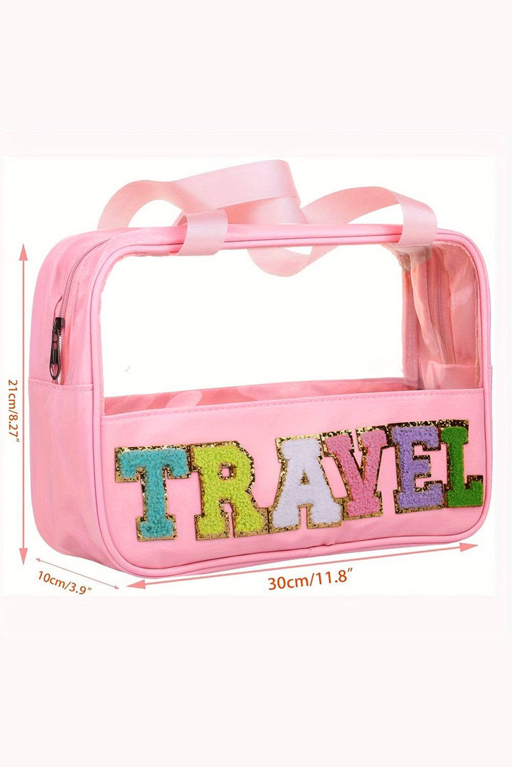 a pink bag with the words travel on it