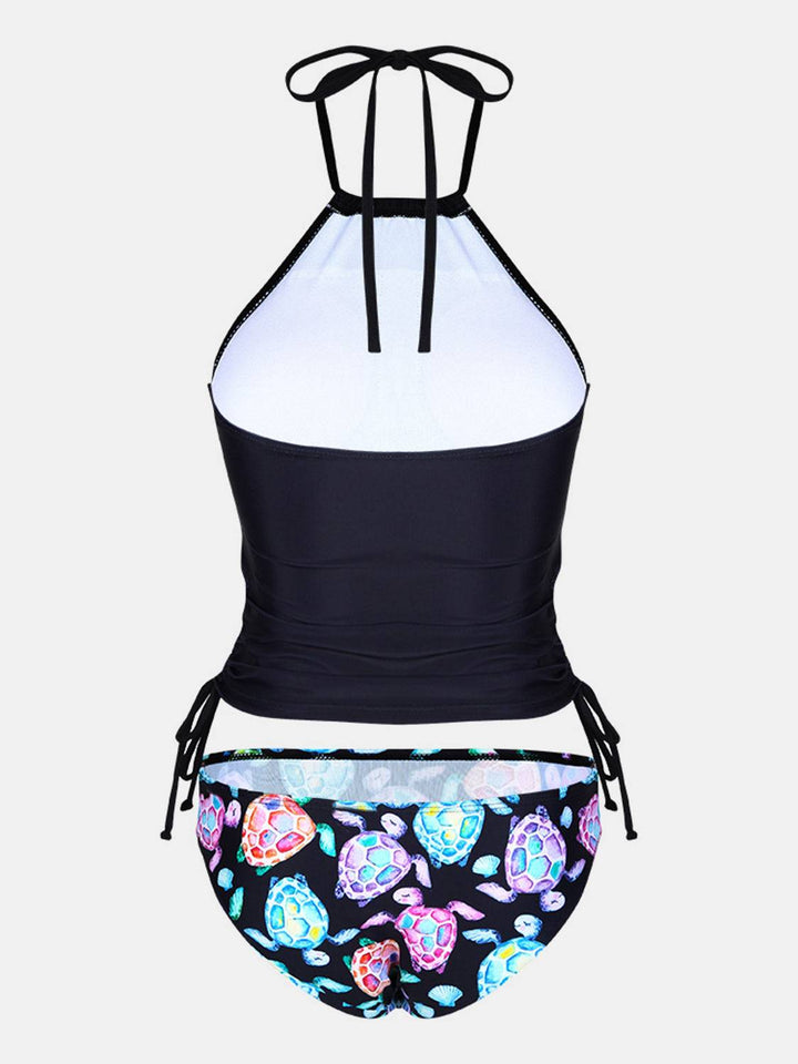 a women's bathing suit with a flower print bottom