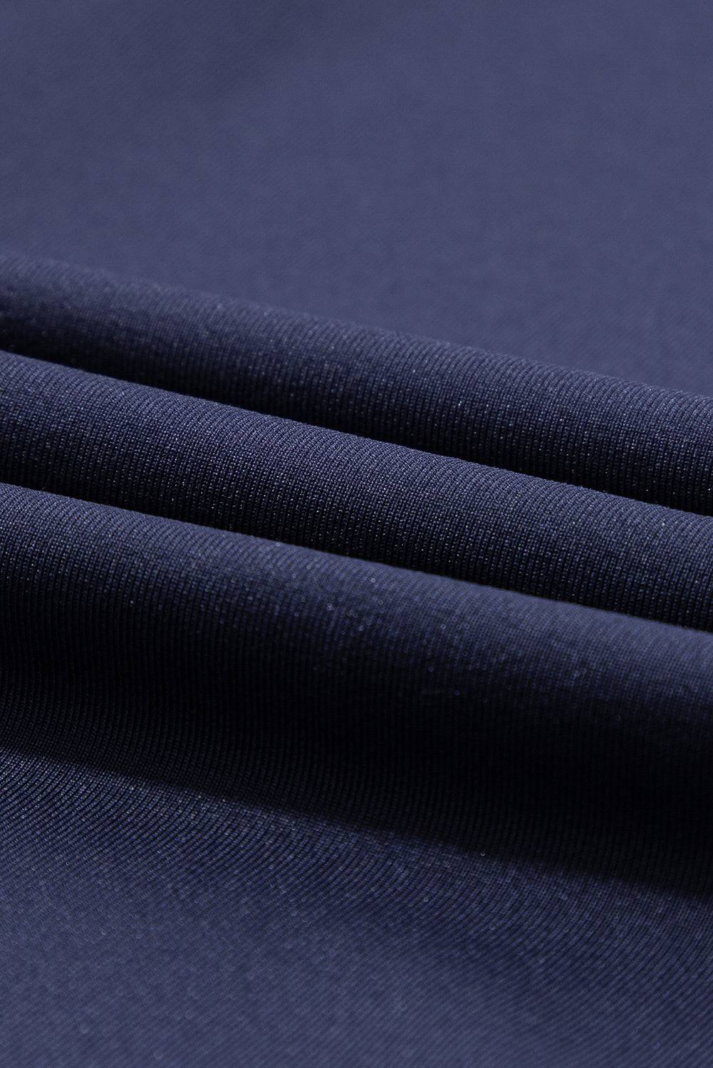 a close up view of a blue fabric