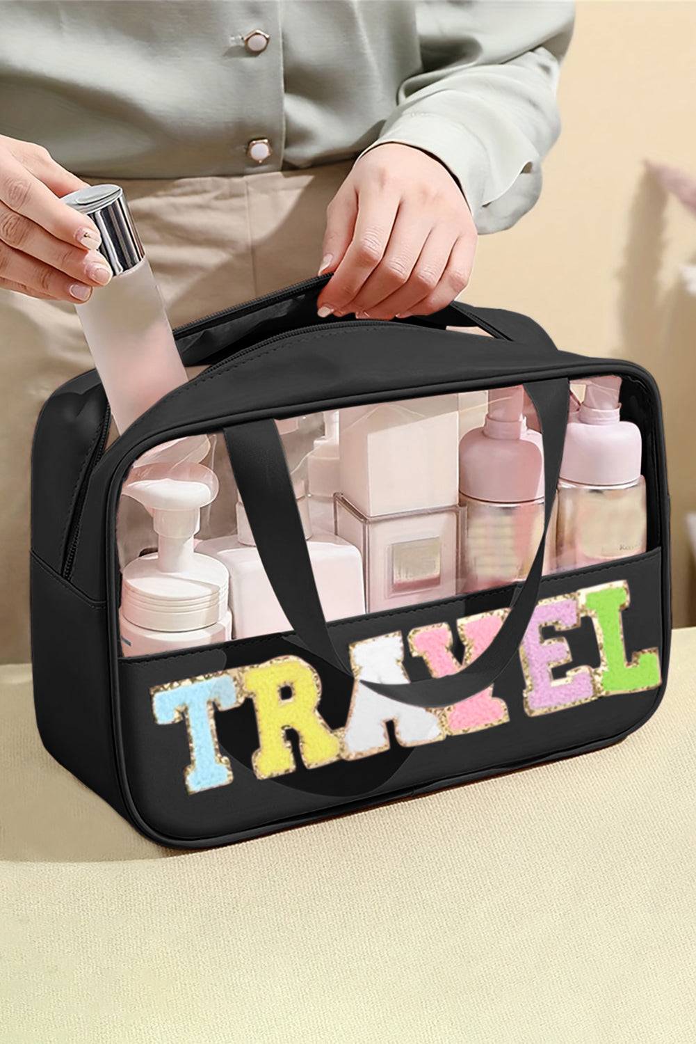 a woman is holding a travel bag filled with personal care products