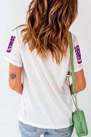 the back of a woman's shoulder with a green purse