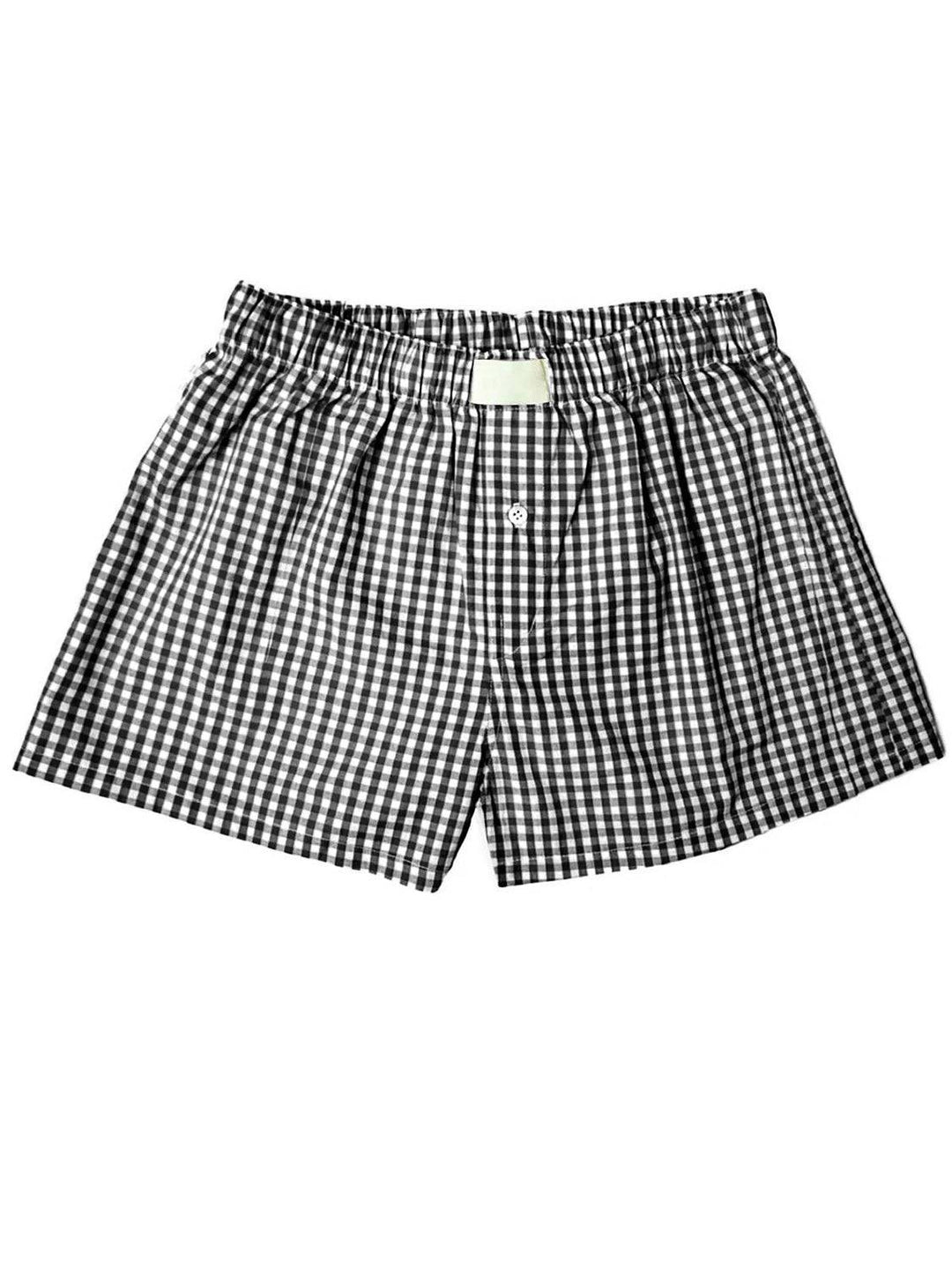 a black and white checkered boxers with a white tag