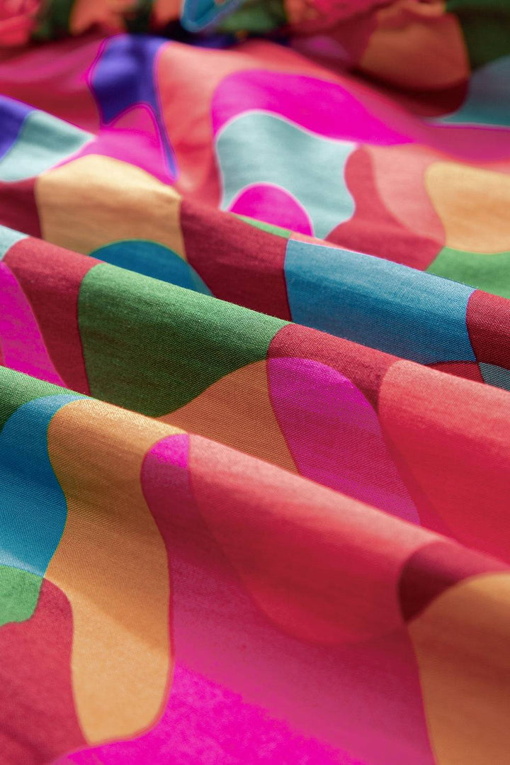 a close up of a colorful fabric with a design on it