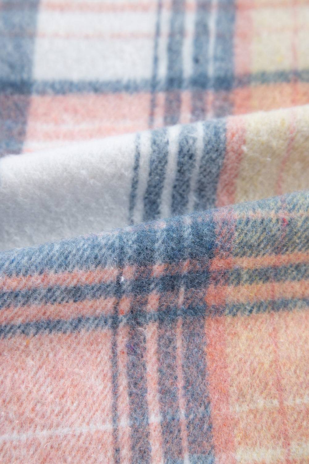 a close up of a plaid fabric