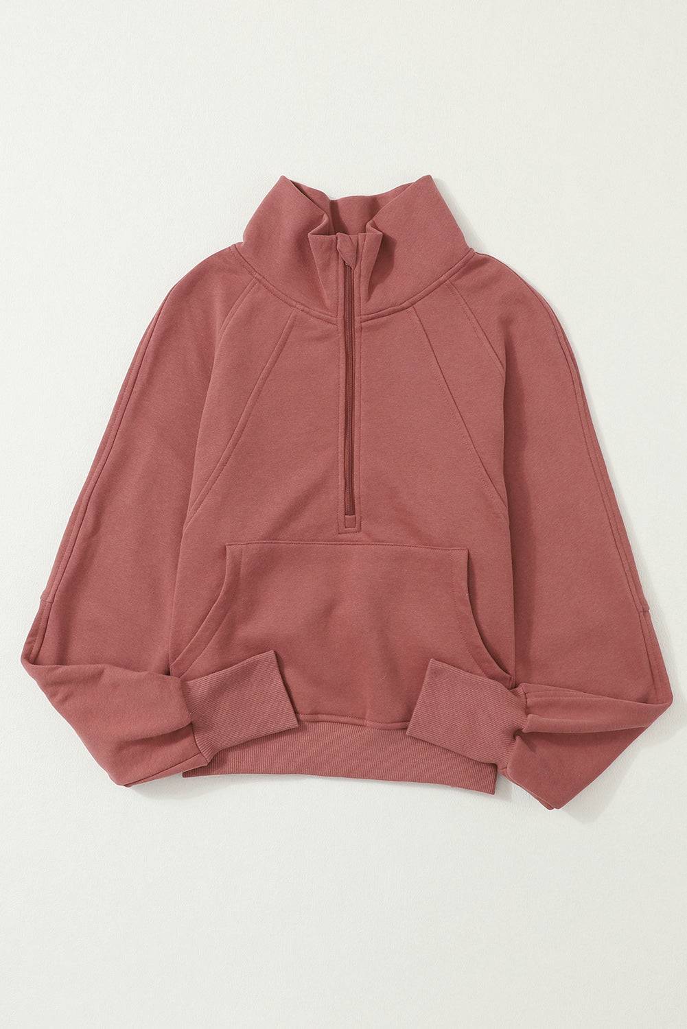 a picture of a pink sweatshirt on a white background