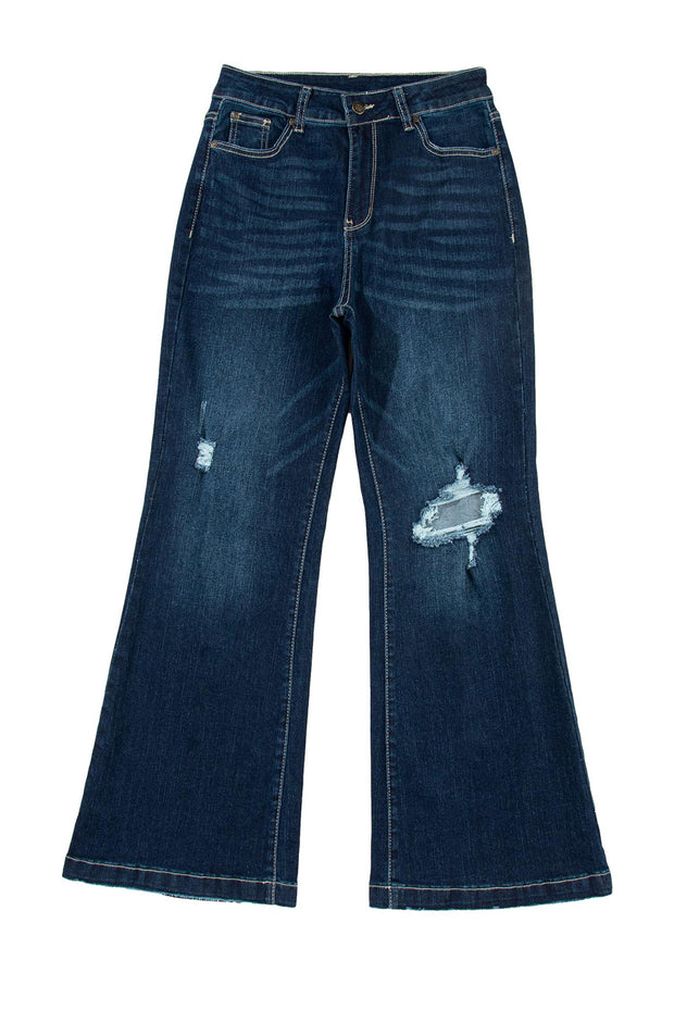 a pair of blue jeans with holes on them