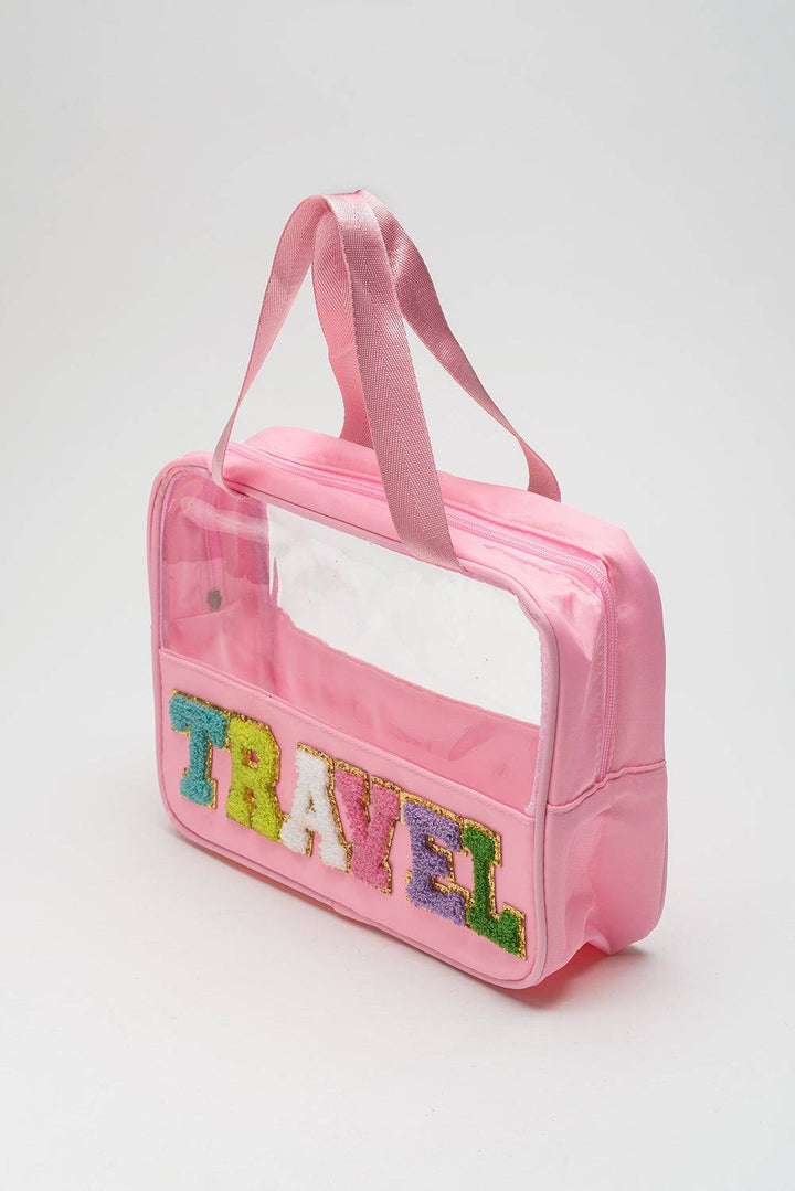 a pink travel bag with the word travel printed on it