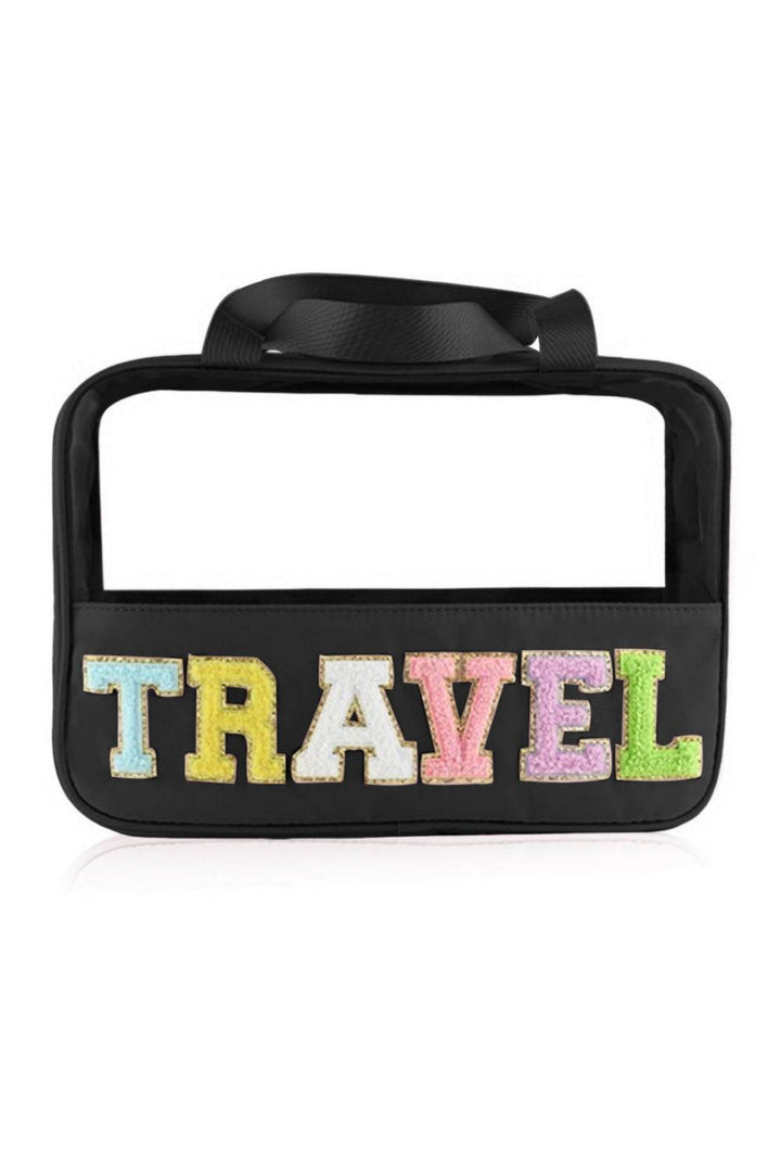 a black bag with the word travel printed on it