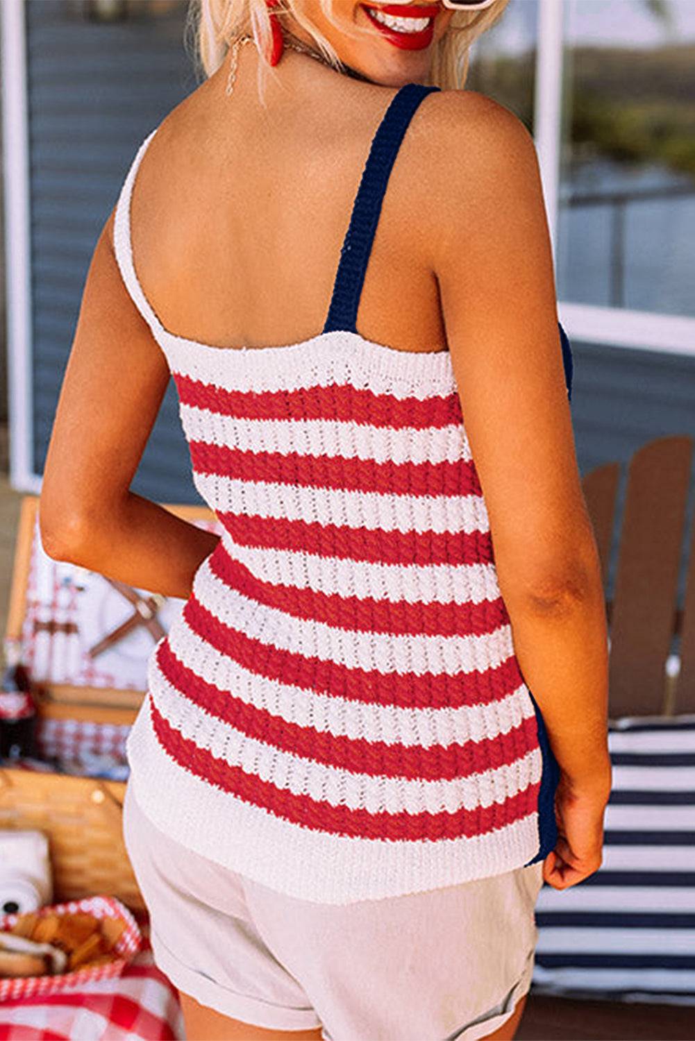 a woman wearing a red, white and blue striped tank top