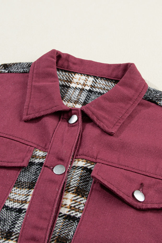 a close up of a red shirt with a plaid pattern