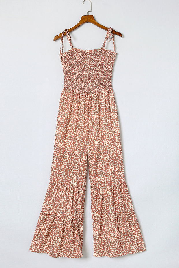 a women's jumpsuit hanging on a hanger