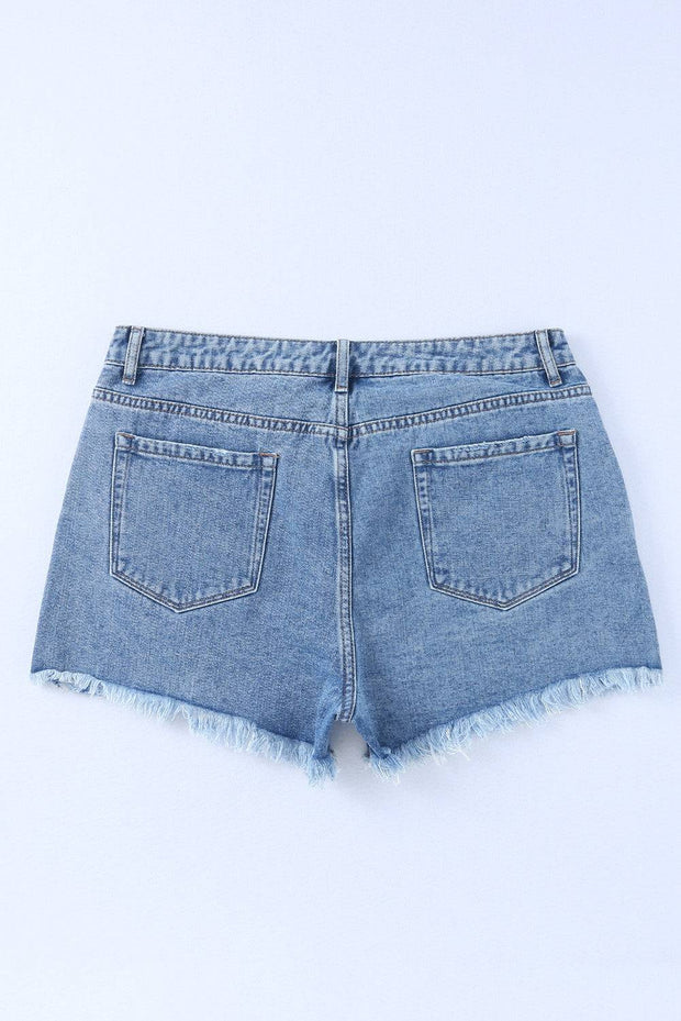 a pair of blue jean shorts with frays