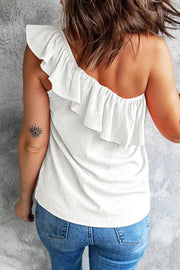 a woman with a tattoo on her left arm