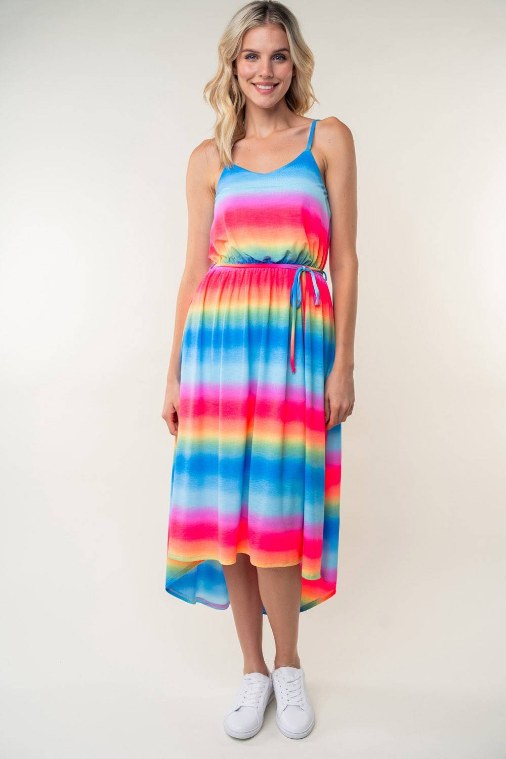 a woman wearing a multicolored dress