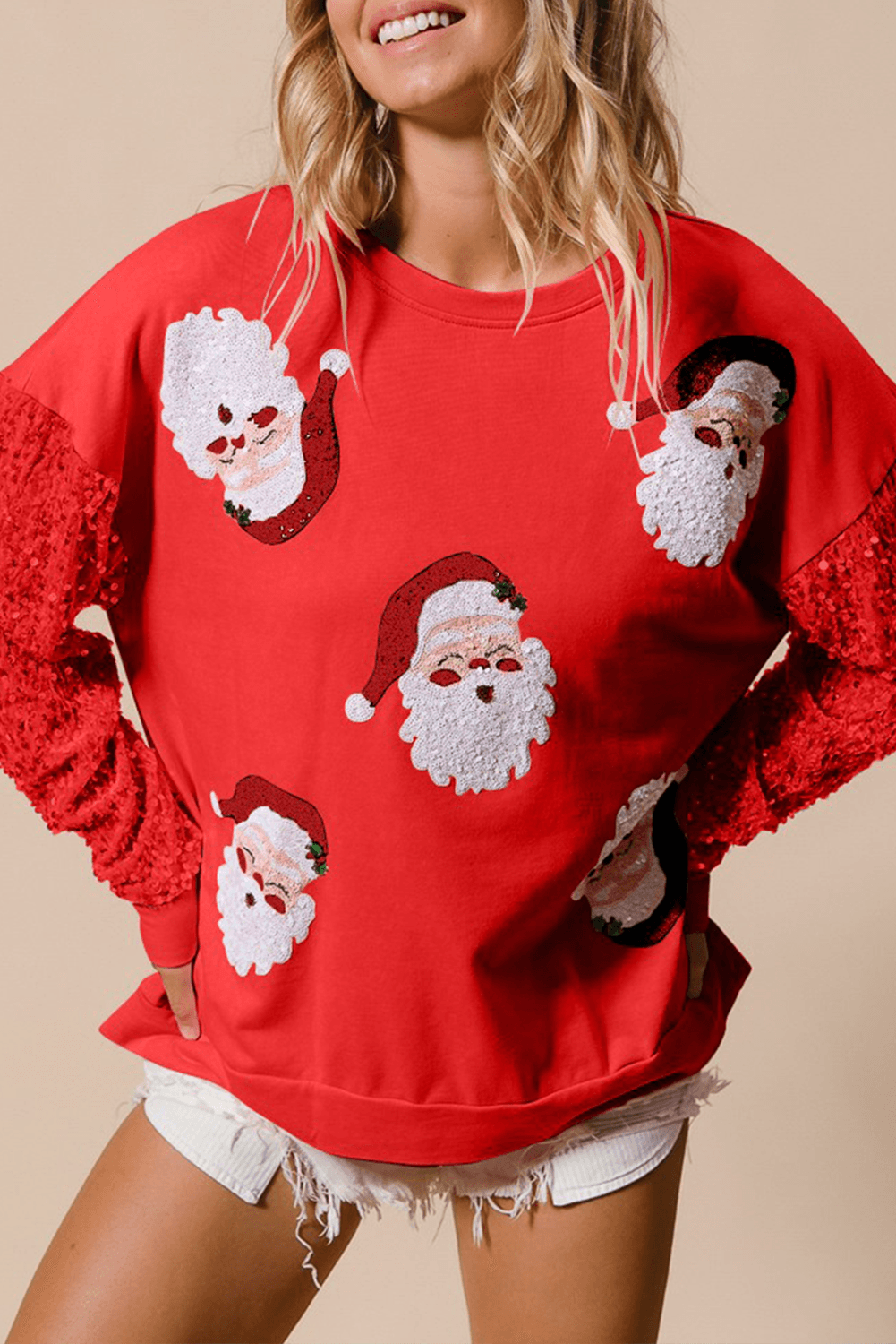 Red Moonlight Jade Christmas sweatshirt with white sequin Santa faces and red glitter sleeves, festive winter top from Faith & Co. Boutique.