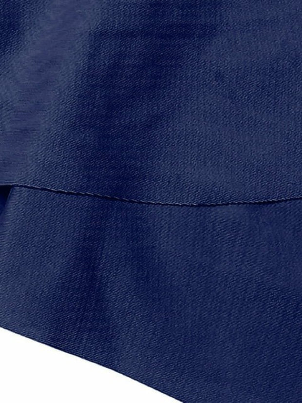 a close up of a blue sheet on a white background