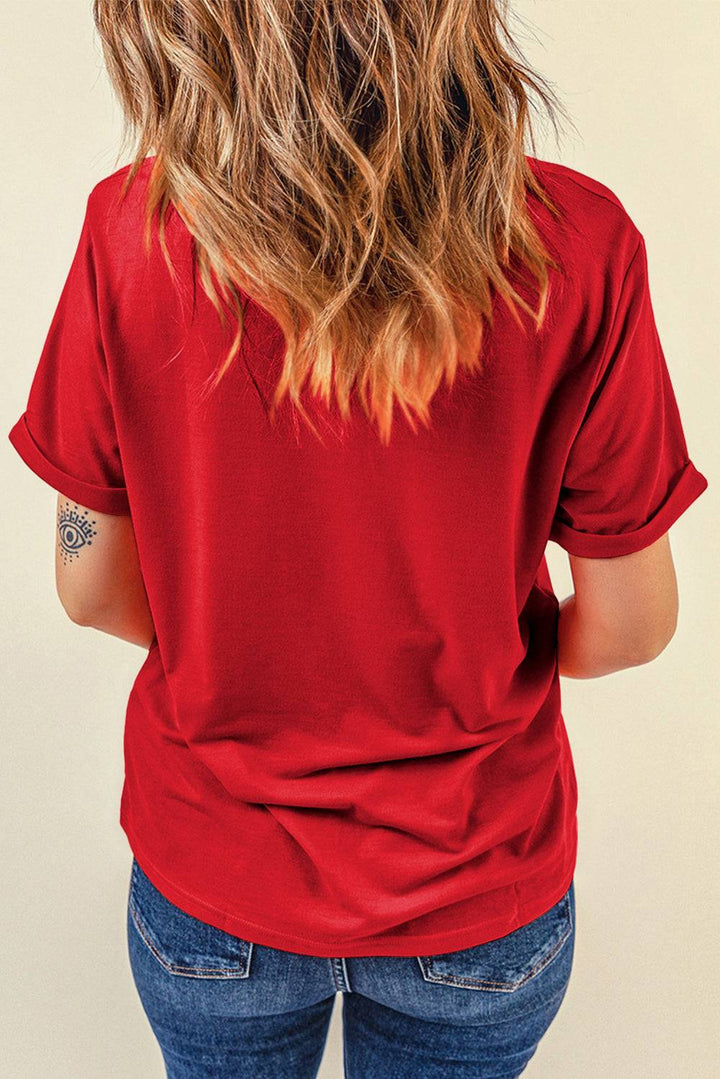 the back of a woman's red shirt
