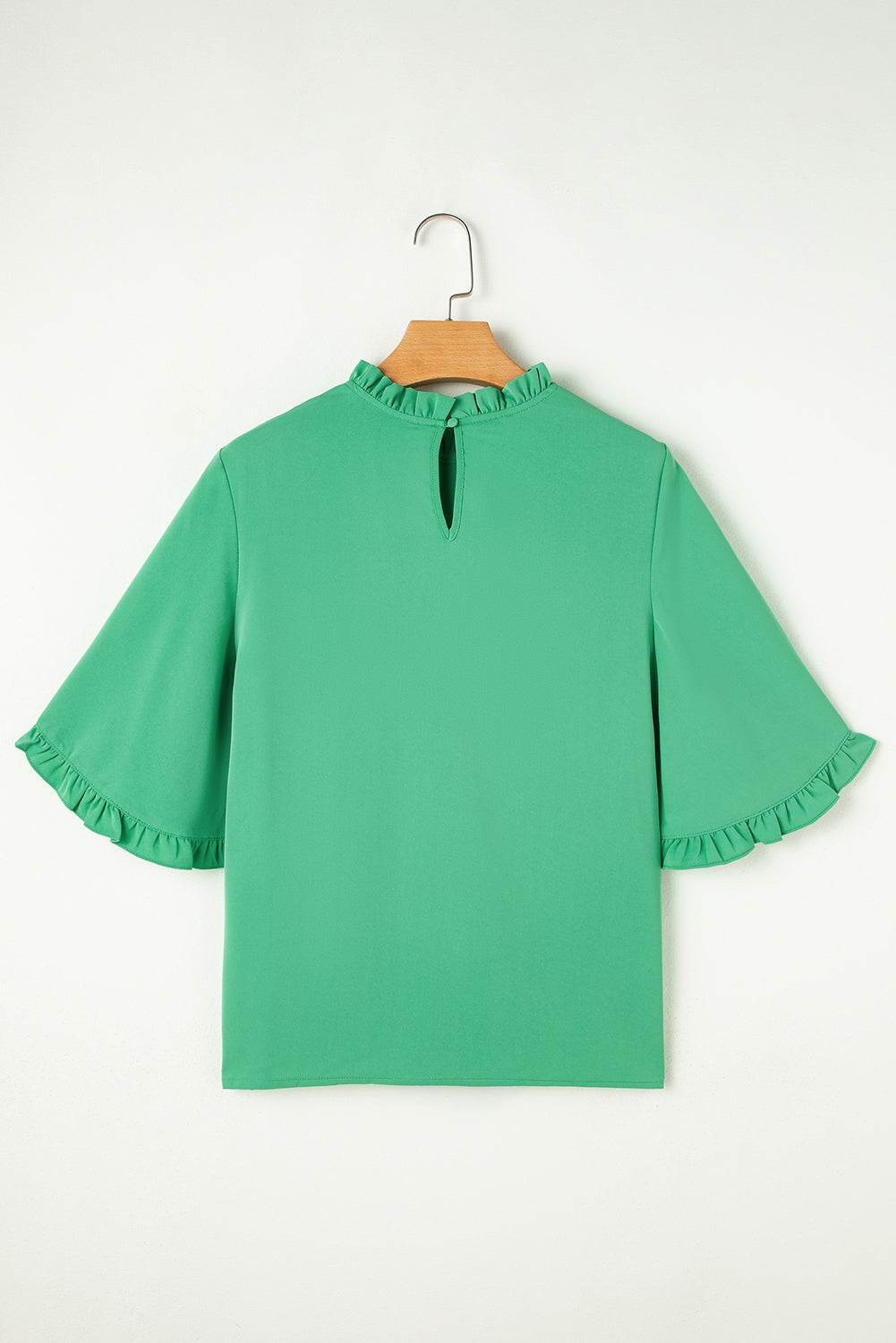 Flat lay back view of Green Frilly Round Neck Wide Half Sleeve Blouse with keyhole closure, great for casual summer outfits.