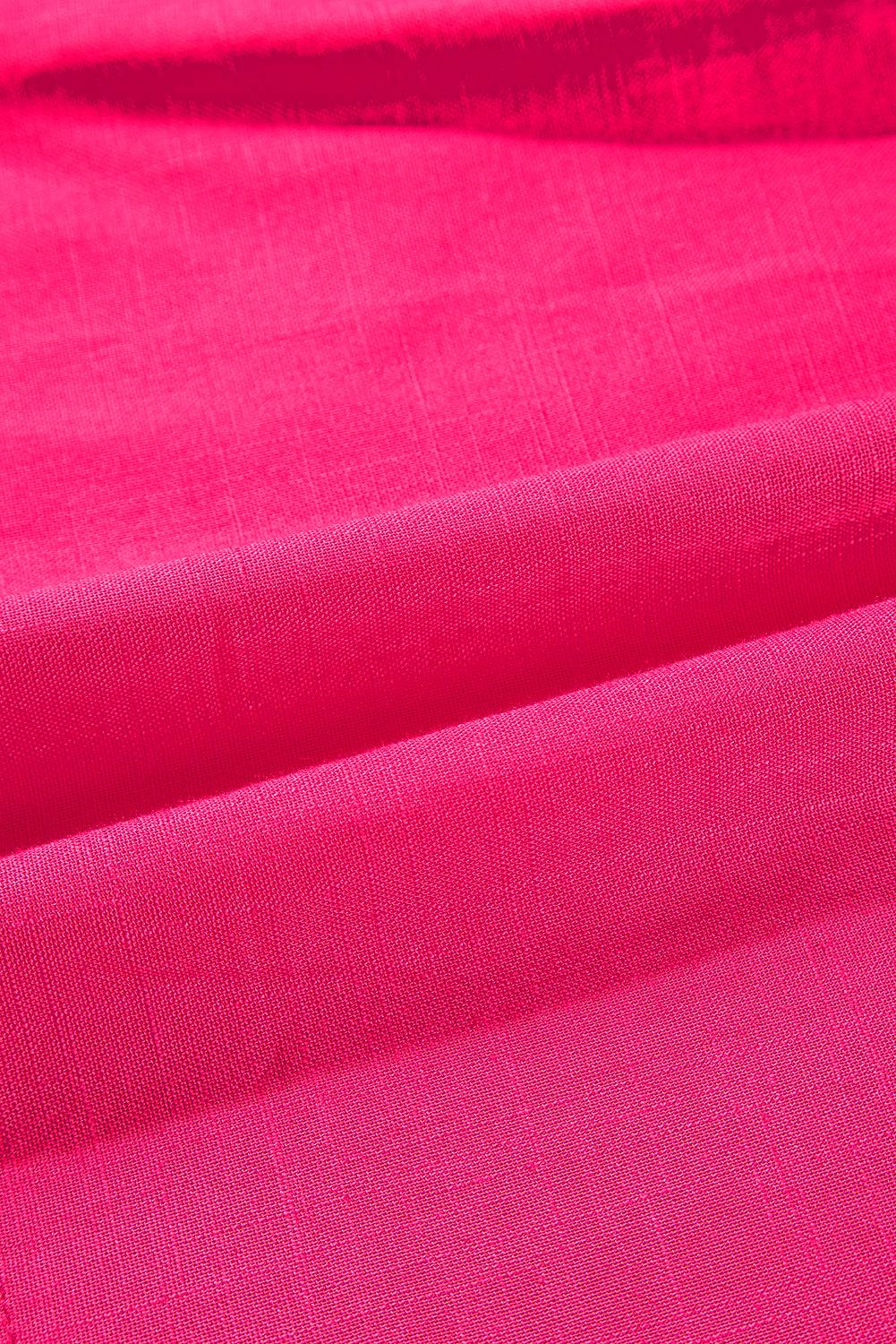 a close up of a bright pink fabric