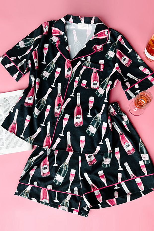 a women's pajama set with a bottle of wine and a glass