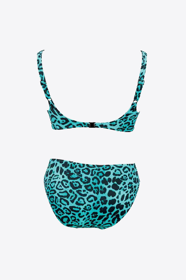 a bikini top and bottom with a leopard print
