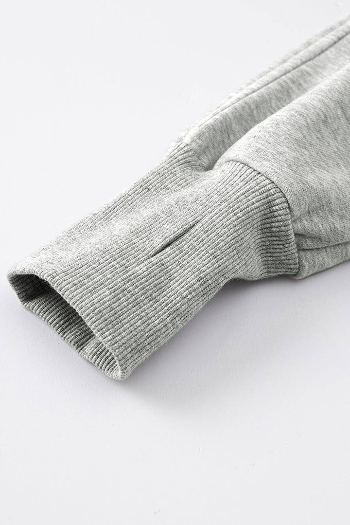 a close up of a pair of gray sweatpants