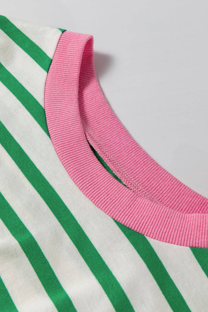 a close up of a pink and green striped shirt