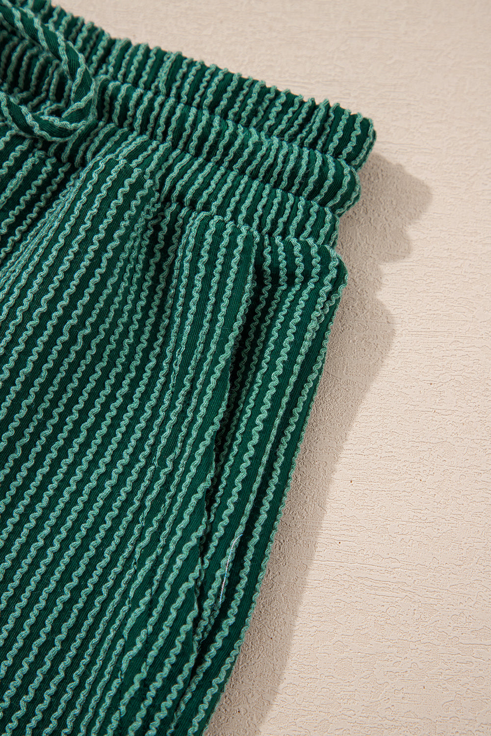Pocket detail on green Evergreen JOLLY Corded Pants. Functional and stylish for casual wear from Faith & Co. Boutique.