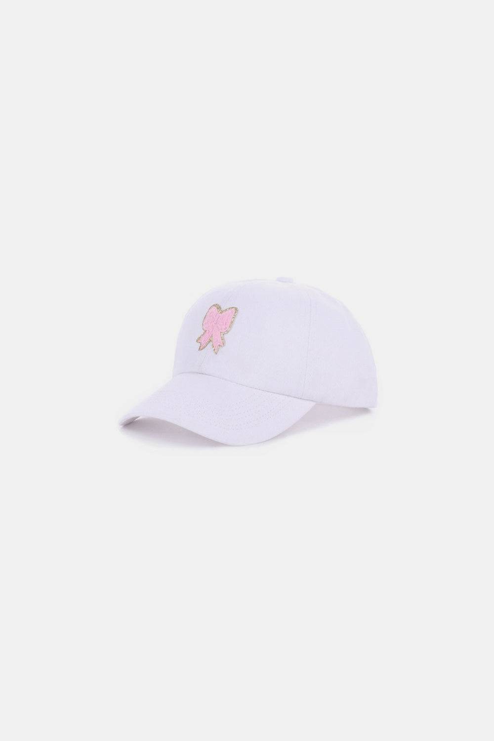 a white baseball cap with a pink butterfly embroidered on the side