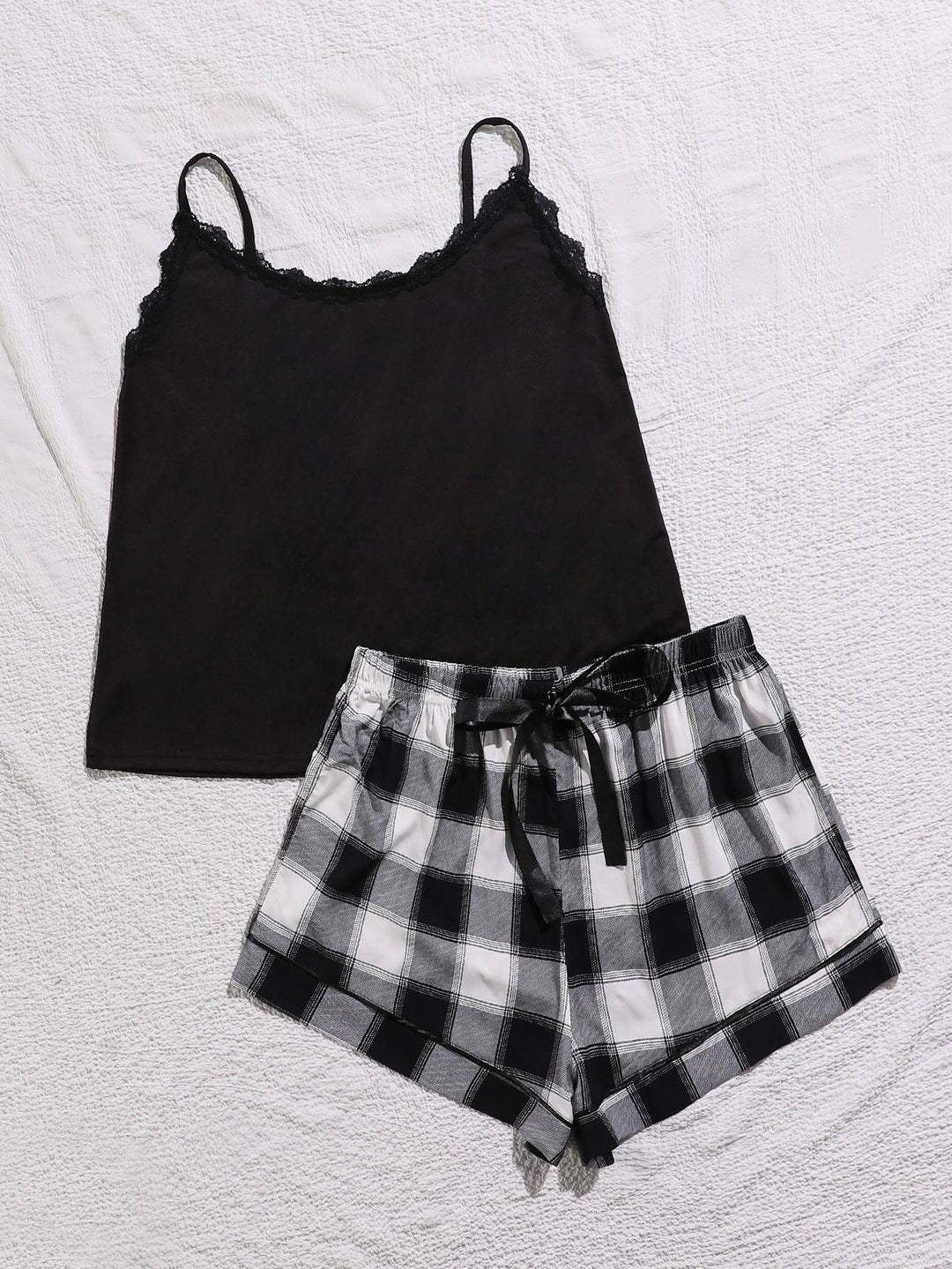 two pieces of black and white checkered shorts