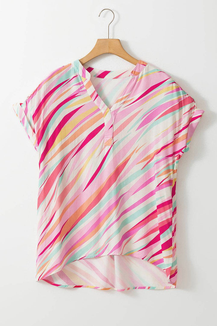 a colorful shirt hanging on a hanger