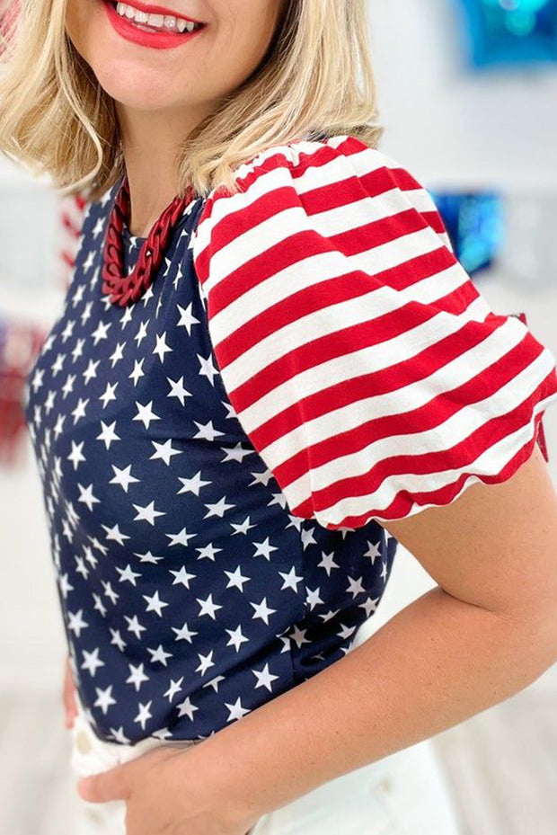 a woman wearing a patriotic top and a red, white, and blue hat