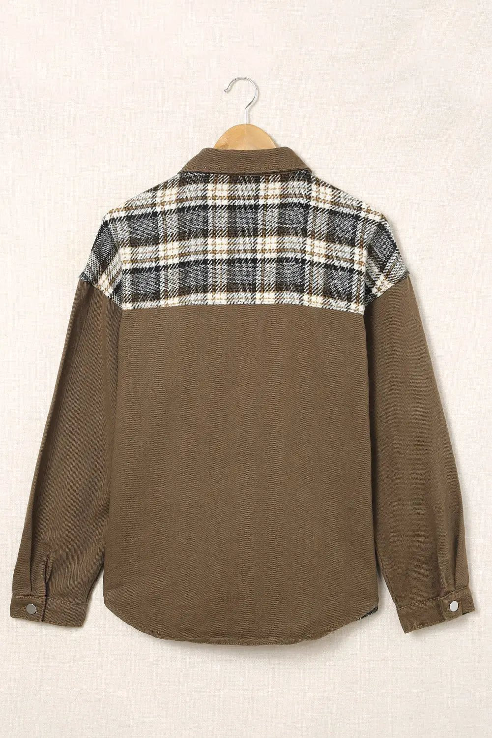 a brown shirt with a checkered shirt collar