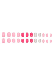 a row of pink and white nail polish strips