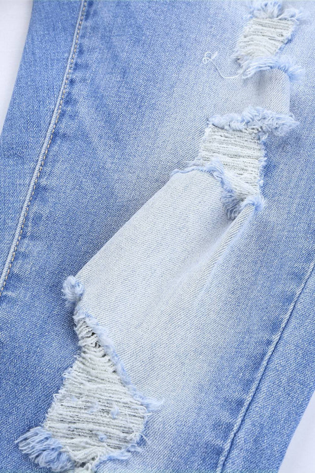 a close up of a pair of ripped jeans