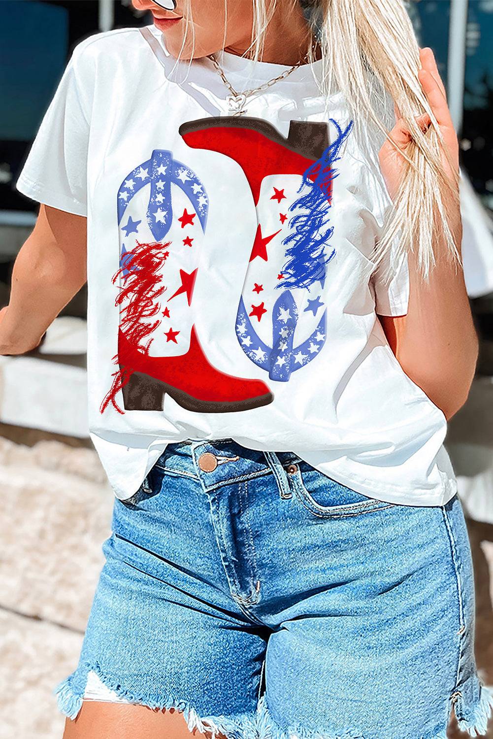 a woman wearing a white t - shirt with a red, white, and blue