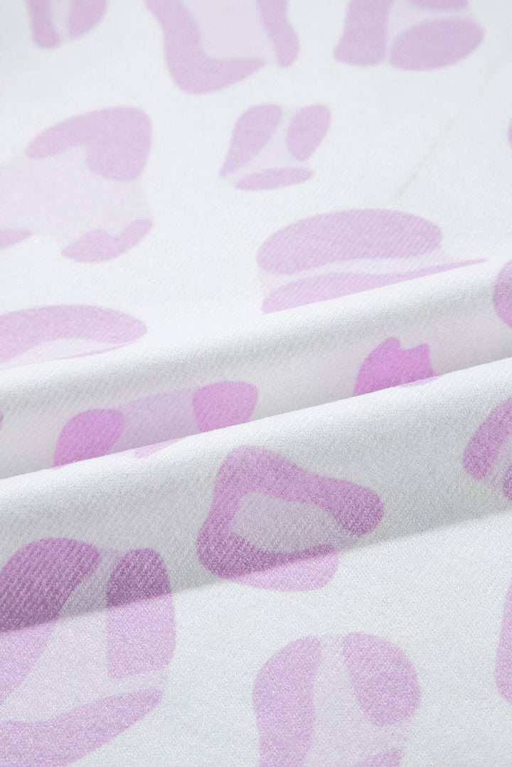 a close up of a pink and white wallpaper