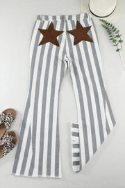 a pair of striped pants with brown stars on them
