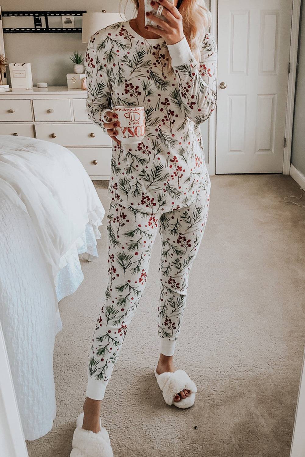 a woman taking a selfie in her pajamas